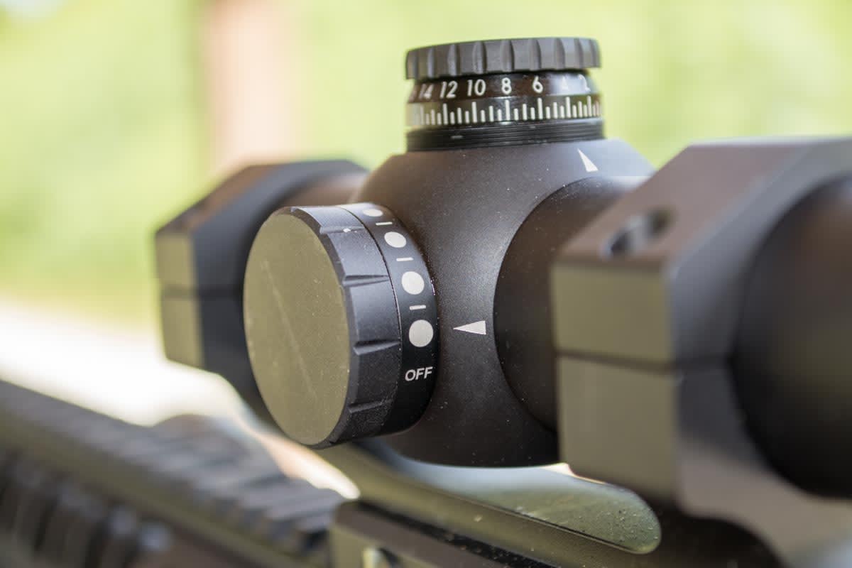 The reticle illumination dial on the left has "off" positions between each power setting, so a single click turns it back on to your preferred brightness level.