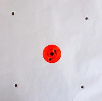 The P4Xi shot a perfect "box" test. Note the first (upper right in bullseye) and last shot, also in the bullseye.